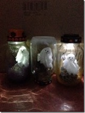 Ghosts in Jars in dark lighted